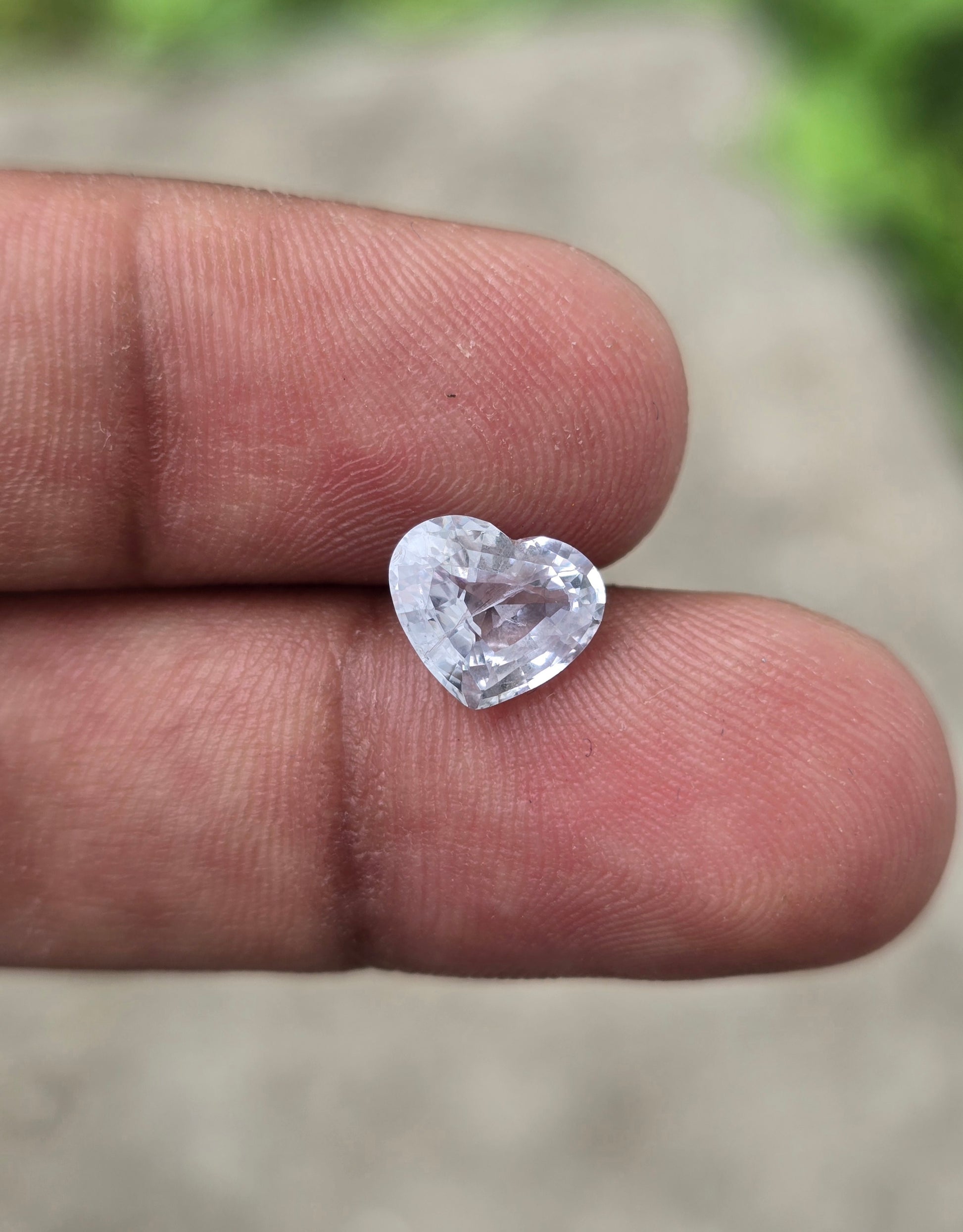 White sapphire heart shaped gemstone with RGTL certification