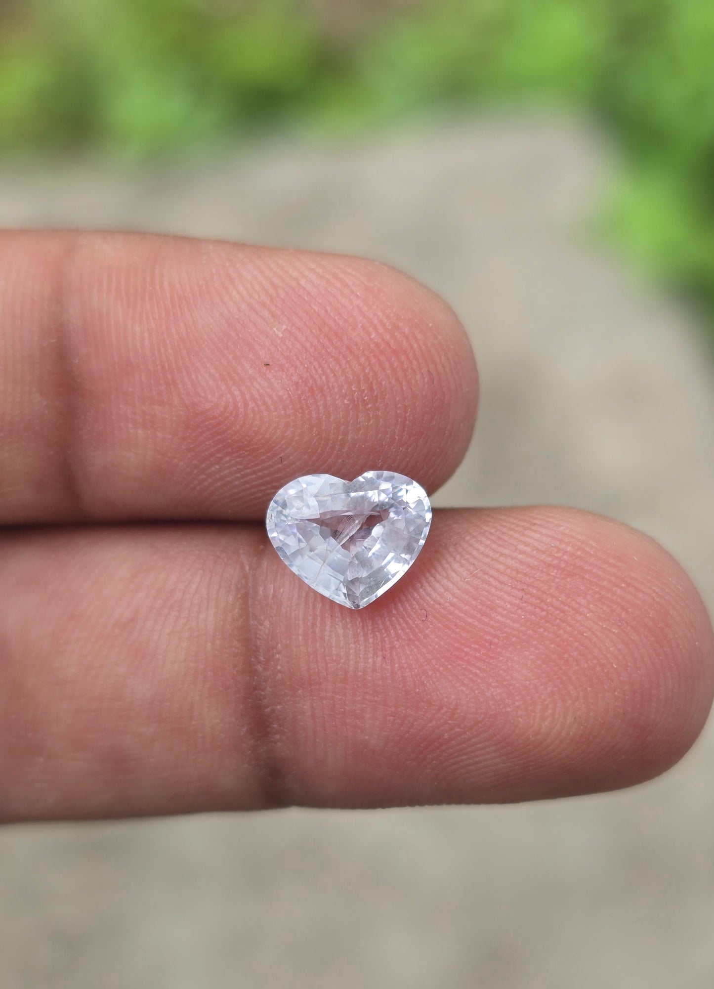 Unheated white sapphire loose gemstone heart shape side angle