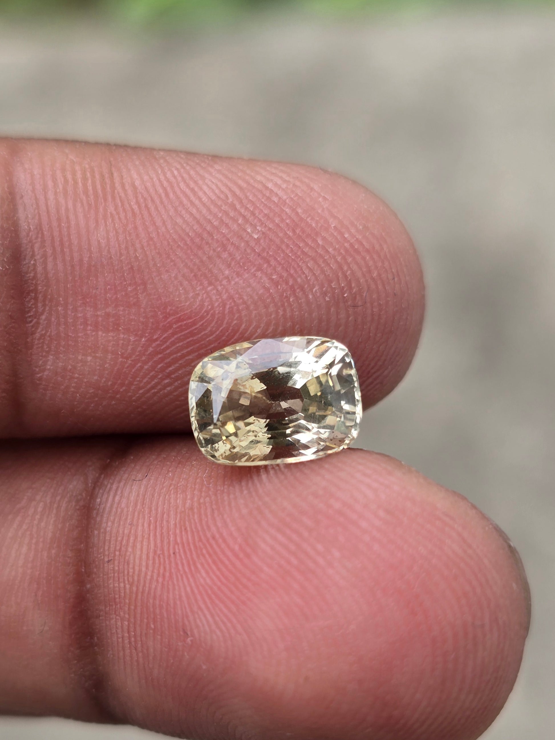 Natural chrysoberyl 2.49 carat cushion shape showing VVS clarity and yellow color